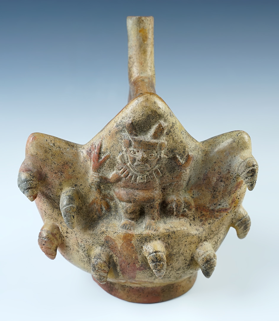 Very ornate style on this 6 3/4" wide Moche Stirrup Handle Pottery Vessel - South America. 