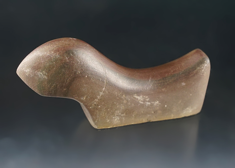 3 3/8" Birdstone made from brown Slate. Overall finish is complete but lacks drilling. 