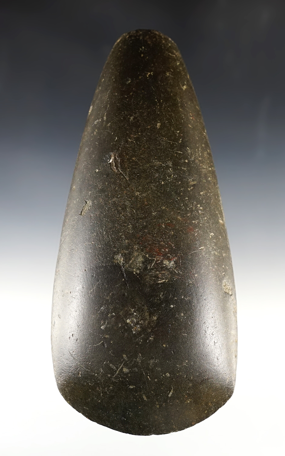 6 13/16" highly polished Hardstone Celt in nice overall condition. Found in the Ohio/Indiana area.