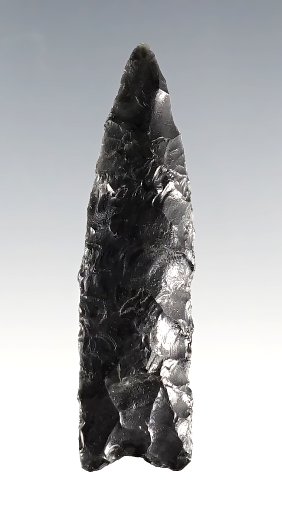 2 3/16" Obsidian Point in excellent condition. Found 35 miles S. of Santa Fe, New Mexico in 1943.
