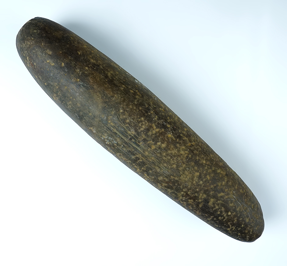 Heavily patinated 10 1/8" well polished Hardstone Roller Pestle recovered in the Midwest. 