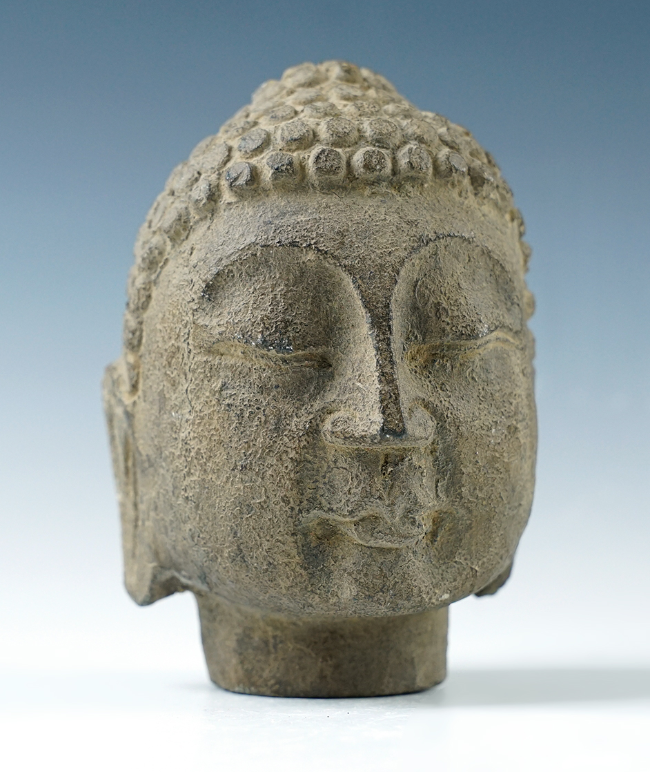 4 1/8" carved stone head recovered in Southeast Asia. 
