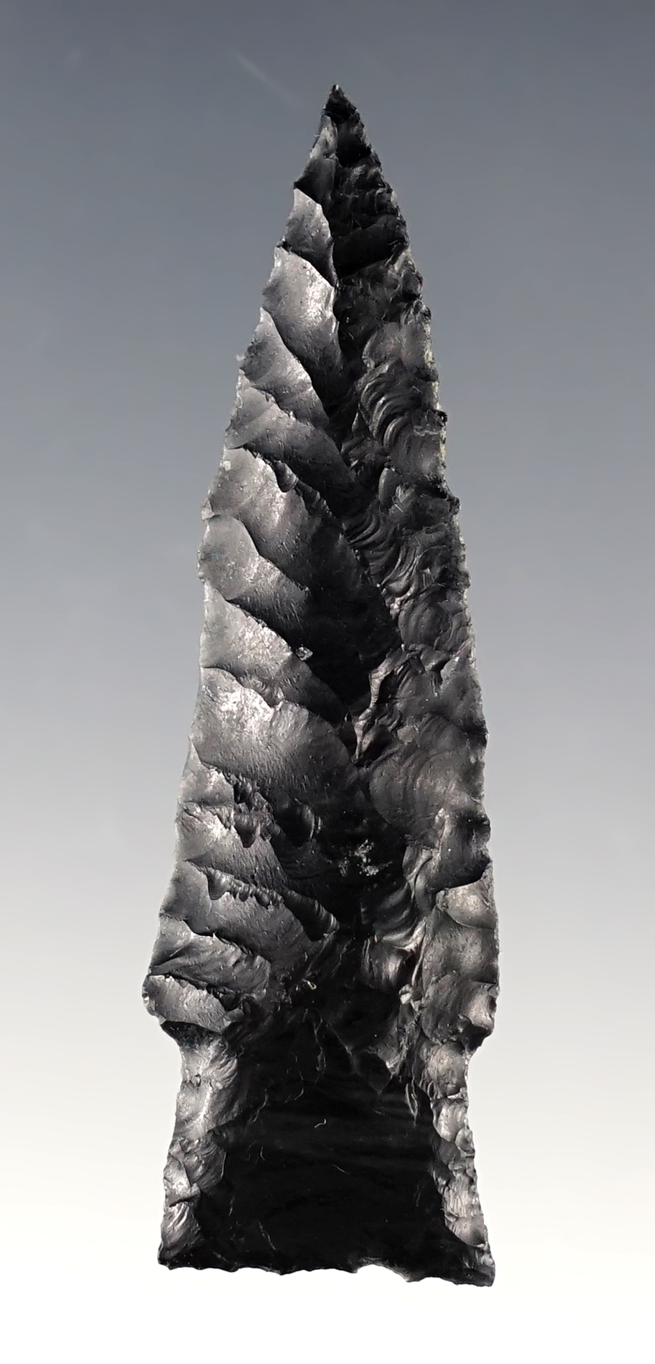 Superb flaking on this 2 1/4" Great Basin Stemmed Point made from patinated Obsidian.