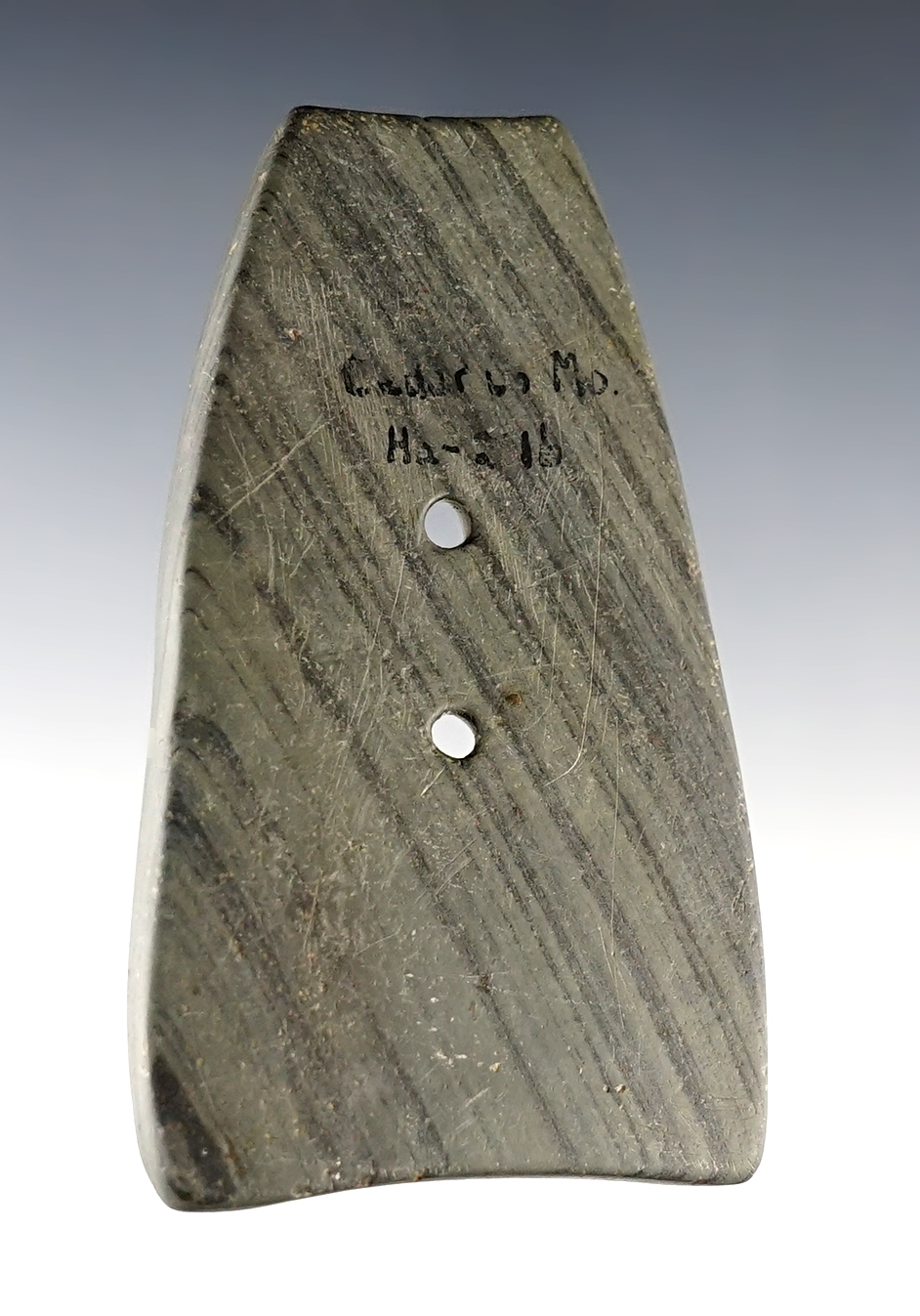 Uniquely styled 3 3/8" Gorget made from banded slate with nice mineral deposits on surface.