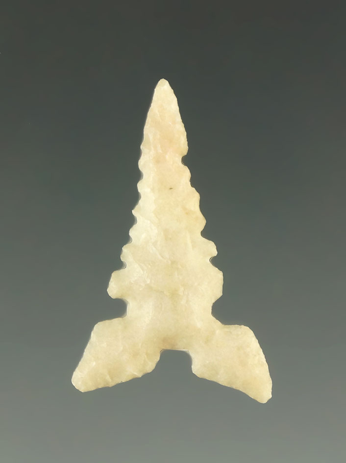 Well shaped 1 1/8" Toyah with nice edge serrations found in Texas. Ex. Charles Shewey.