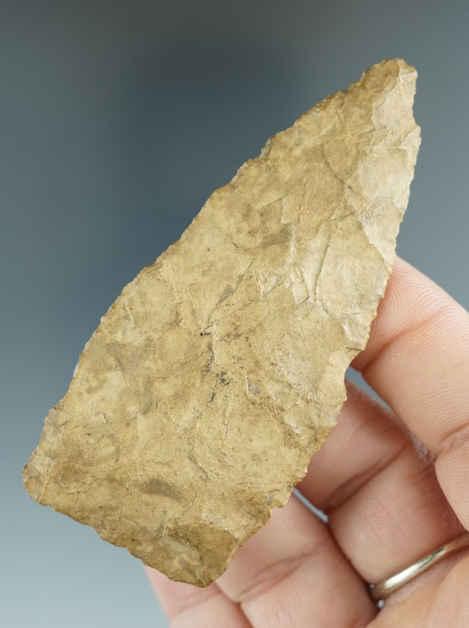 3 1/16" Paleo Lance made of tan Chert. Nice and thin and highly patinated. Found in Lucas Co., Ohio.
