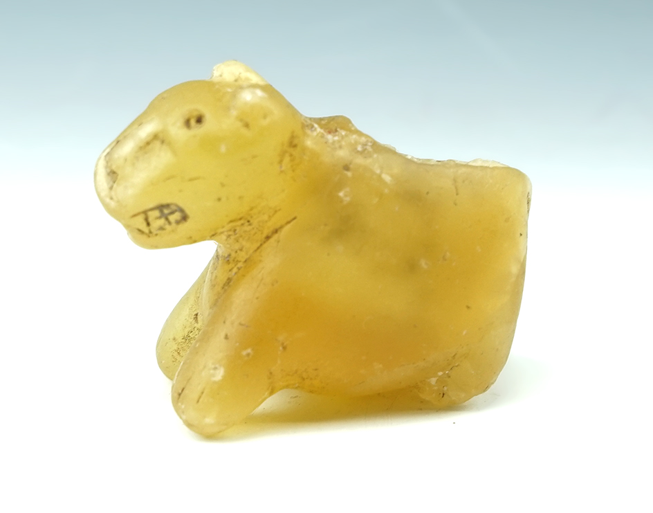 2 1/4" Long Jaguar Effigy Canopa made from highly translucent material. Found in Pisca, Peru.