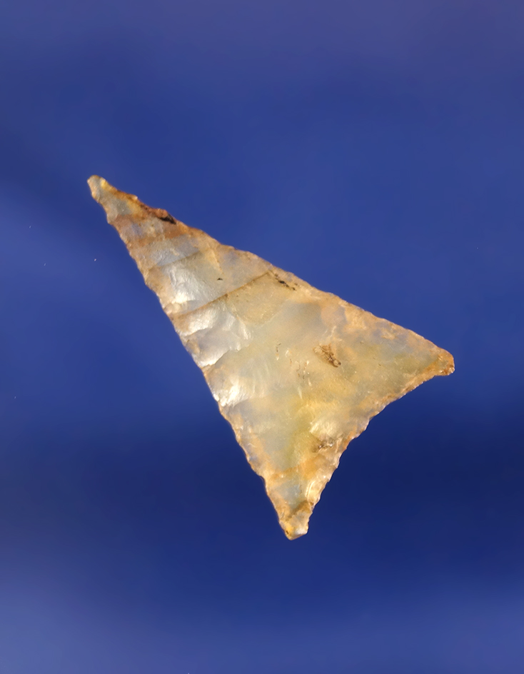 1" highly translucent striped clear agate Triangular point found near the Columbia River.