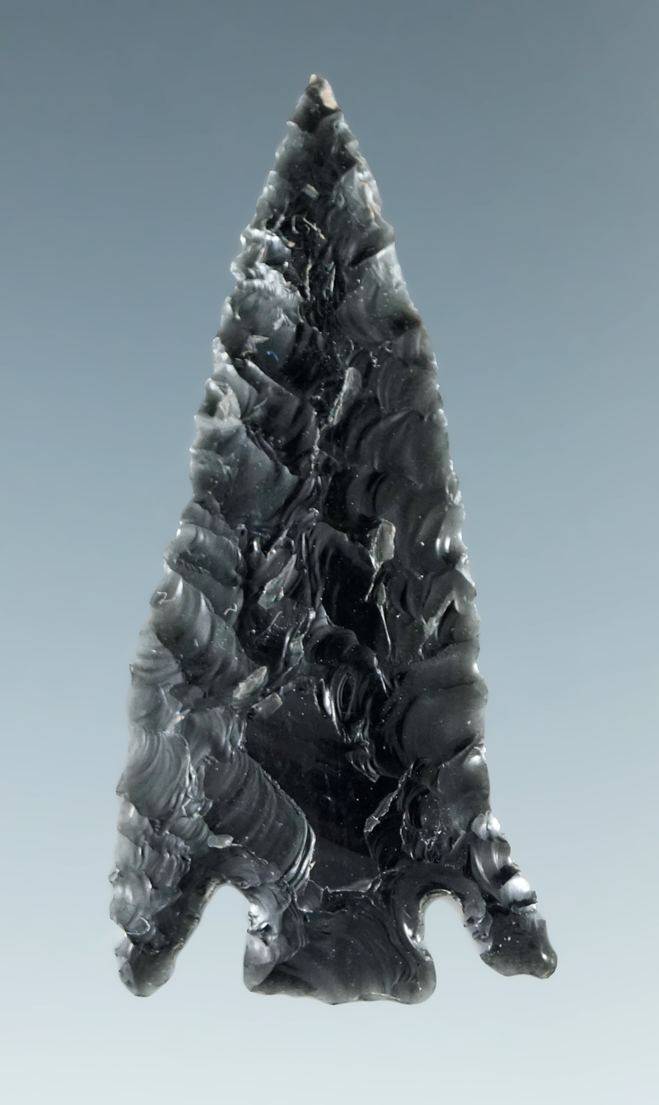 1 3/8" thin and very well flaked obsidian Cornernotch found in Lake County Oregon in the 1940s.