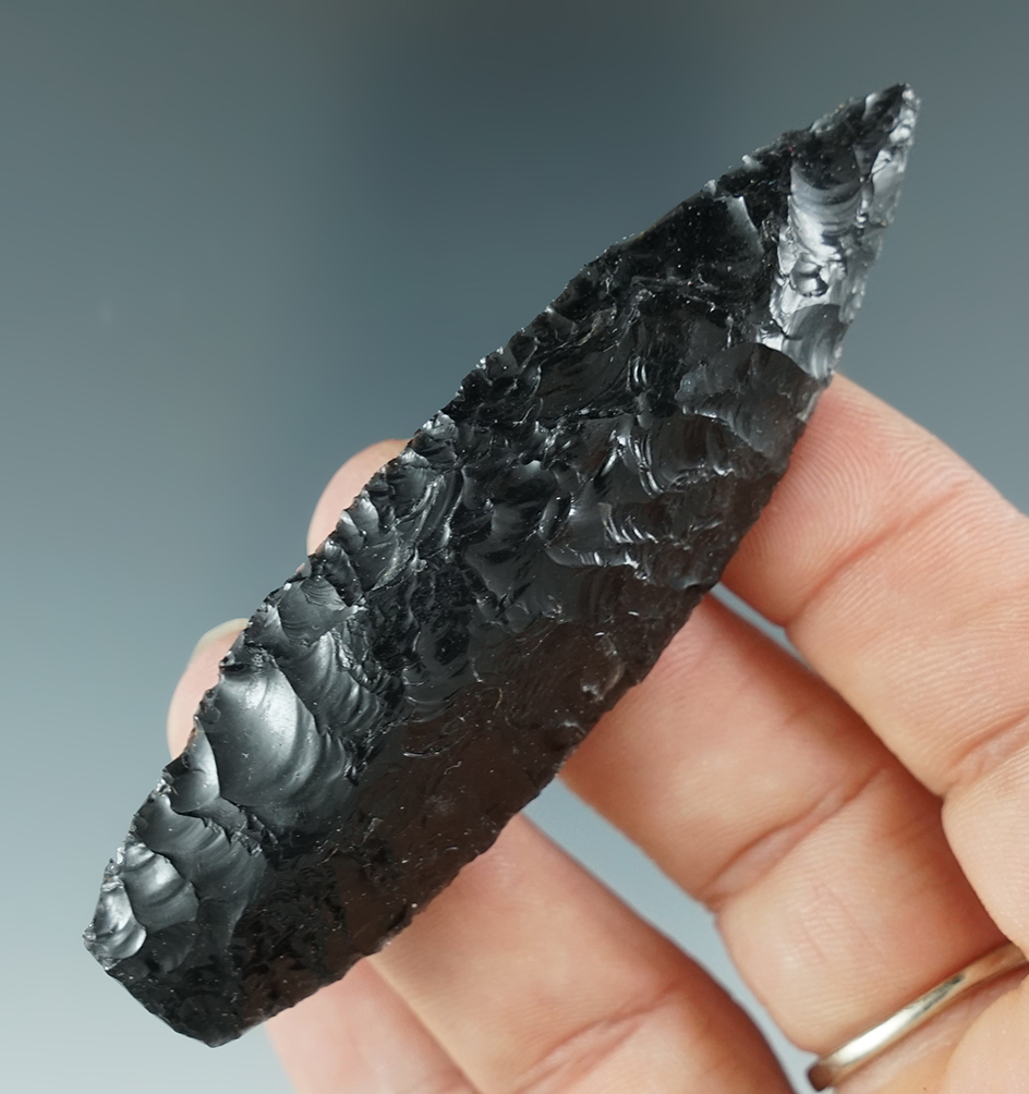 3 1/8" Paleo Parman beautifully flaked from Obsidian. Found in Oregon in the 1950's. Ex. Hall.