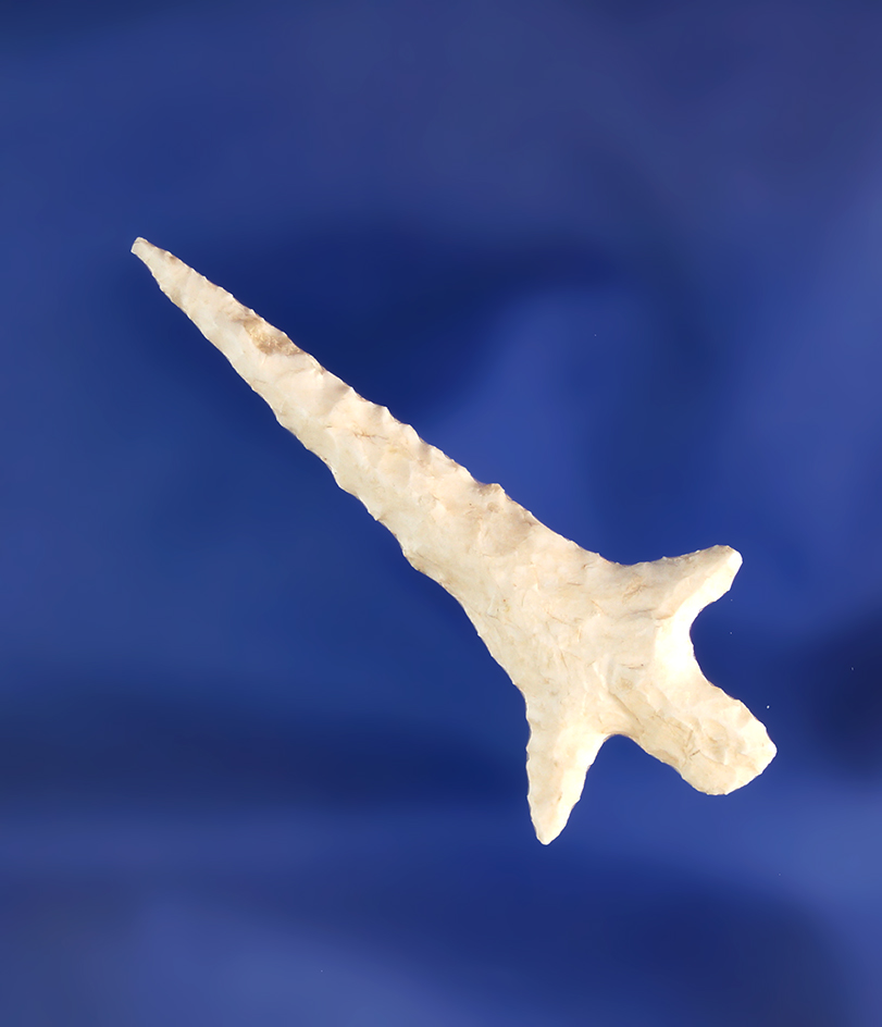 Uniquely styled 1 7/8" stemmed Arrow point with a needle tip. Found in the southwestern U.S.