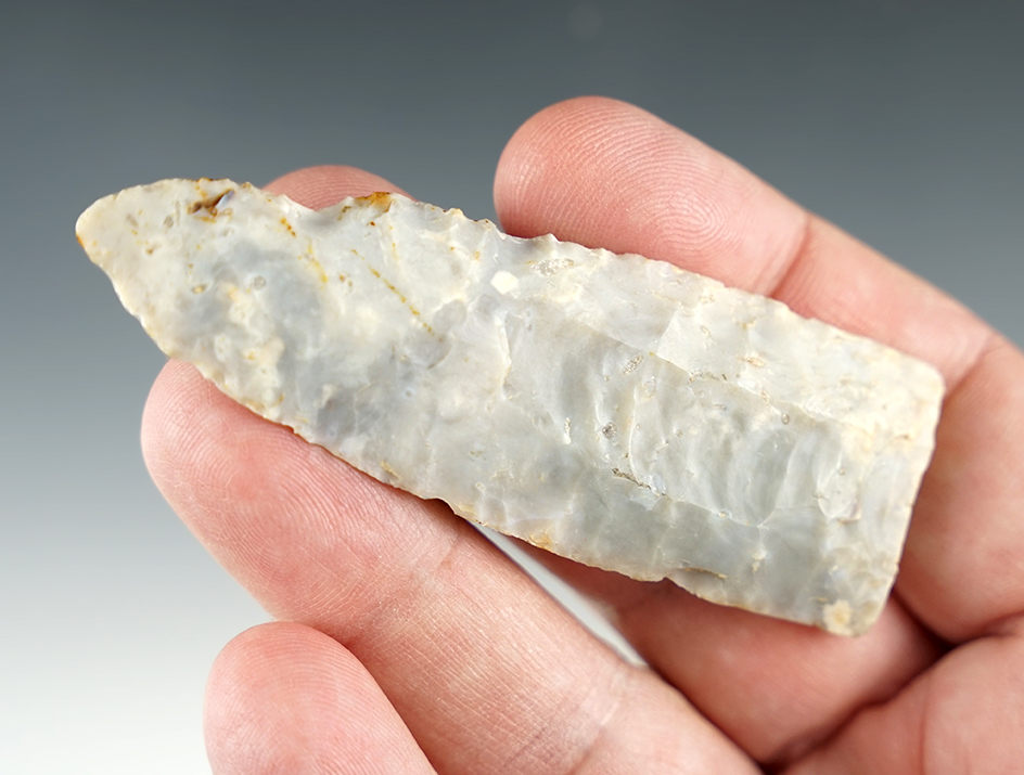 3 1/8" tip section of a Fluted Paleo Clovis found in Ohio. Made from Flint Ridge flint.