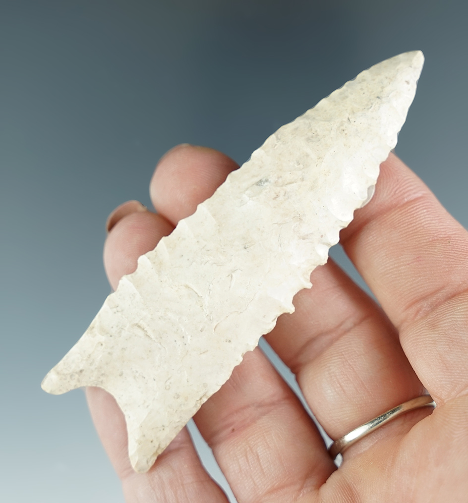 3 1/4" Dalton with restoration to the upper section and one basal ear. Found in Howard Co., MO.