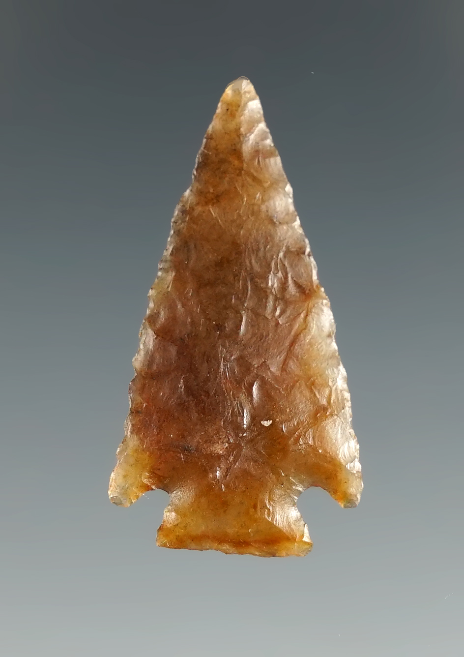 1 3/16" Very well made Cornernotch Bird Point found in Texas made from highly translucent Agate.