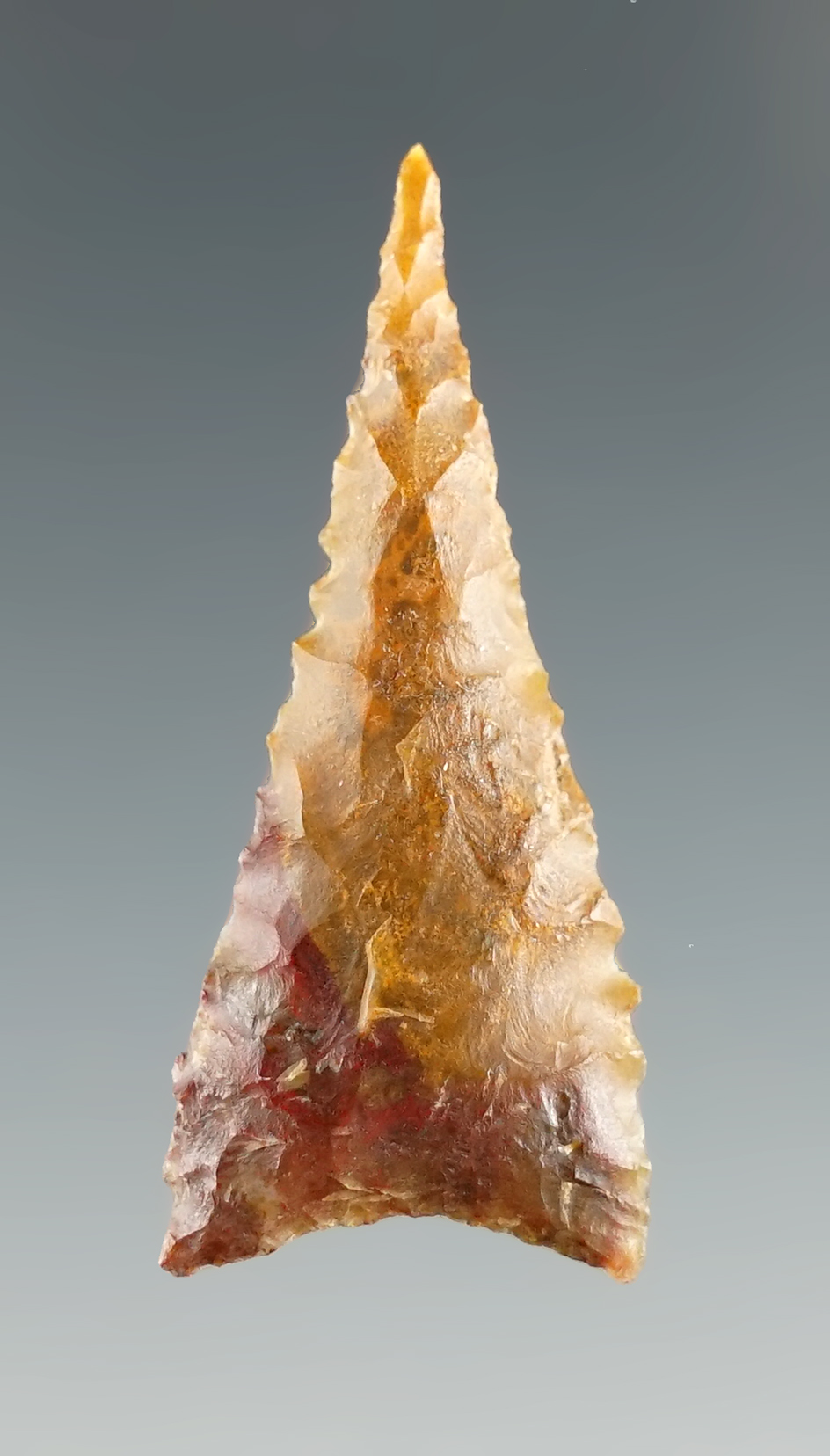 1 3/8" Serrated Triangle found in the southwestern U. S. made from attractive material.