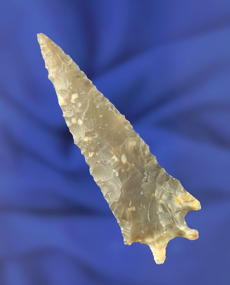 Unique basal style on this 3" serrated Texas dart point.