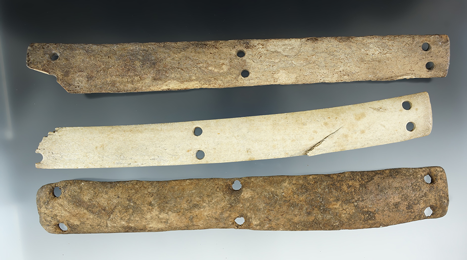 Three sections of Inuit bone armor, largest is 8 3/8".