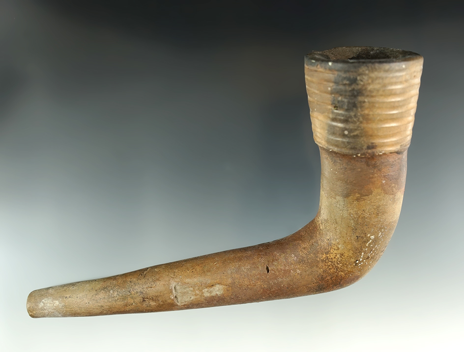 Large 6 1/4" Iroquois clay Ring Bowl Pipe with moderate restoration to the bowl area and stem.