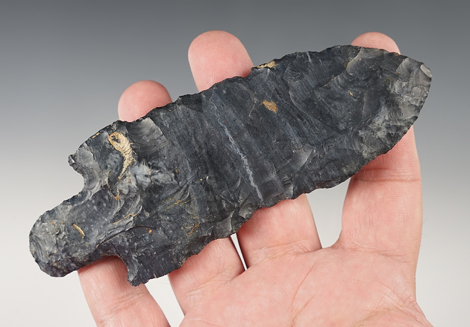 Large 5 1/2" Stemmed Adena Knife with heavy grinding to the stem area. Hardin Co., Ohio.