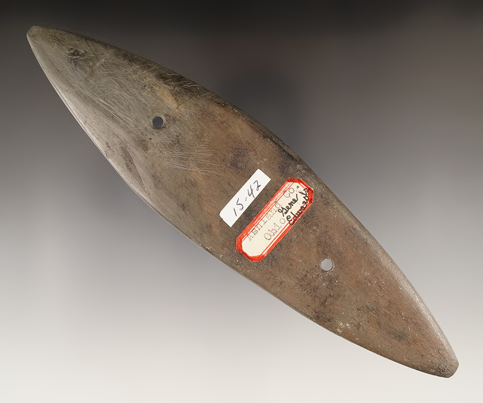 7 1/2" Glacial Kame Bi-pointed Gorget that is one half restored. Found in Ashland Co., Ohio.
