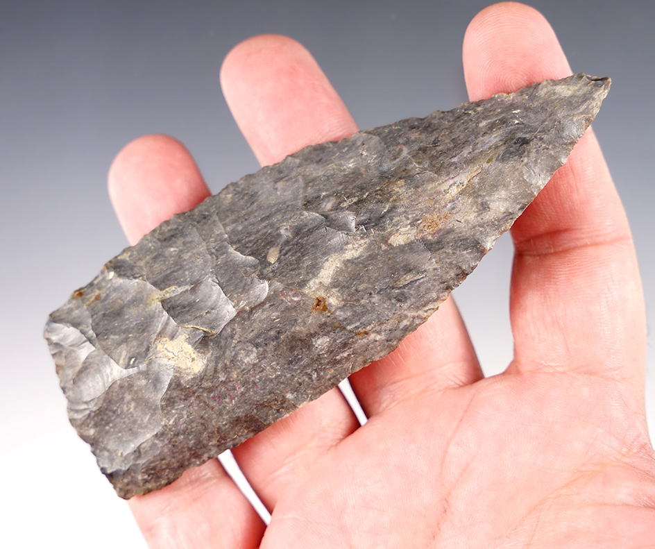 4 5/8" multi-colored Archaic knife made of Coshocton Flint. Found in Ohio.