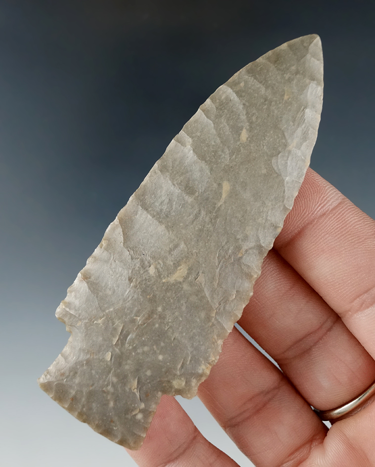 Exceptional flaking on this 2 3/8" Scottsbluff restored by Dennis Bushey. Found by Dan Miller at the