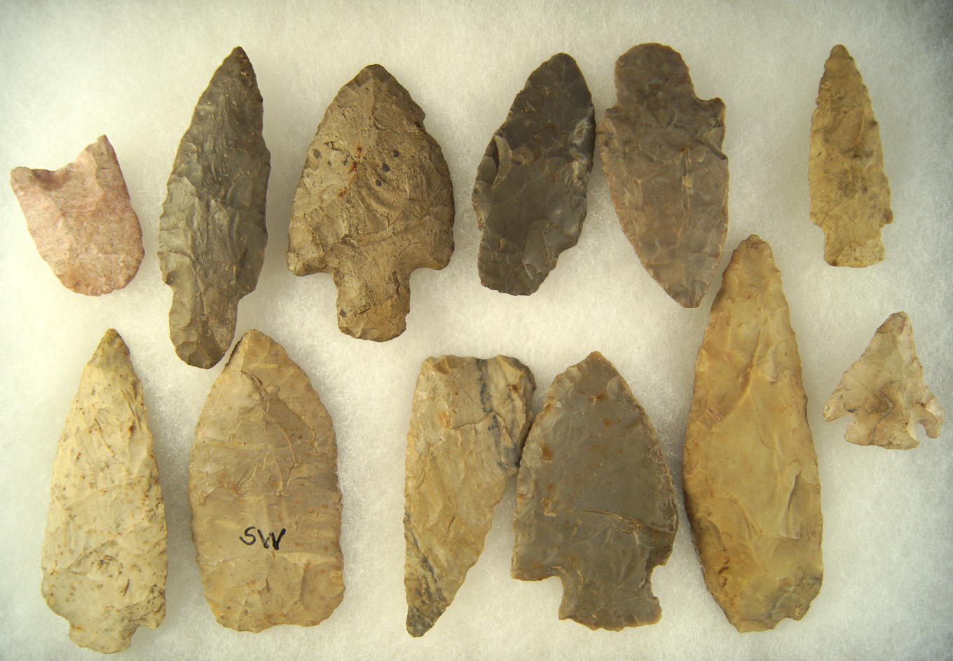 Set of 12 assorted flaked Artifacts, largest is 4 1/4". Ex. Cowan Hood.