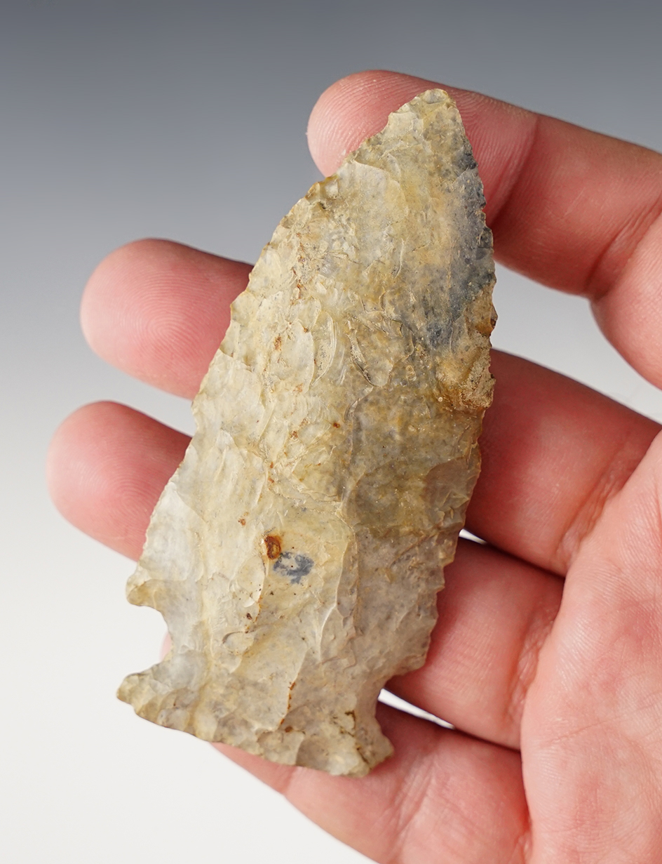 3 9/16" Archaic Sidenotch with a heavily ground base and notches.  Coshocton Co., Ohio.