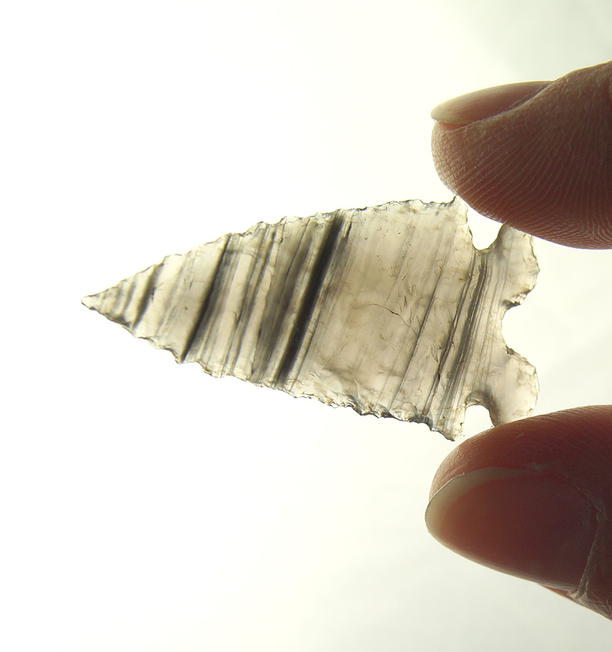 1 7/16" classic style Elko Eared made from highly translucent banded Obsidian. Excellent shape