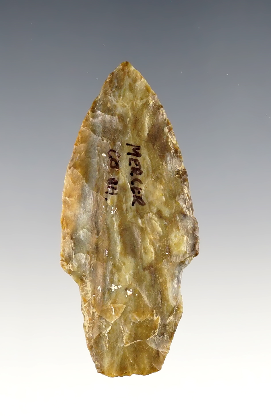 2 7/16" Adena made from colorful flint. Found in Mercer Co., Ohio.