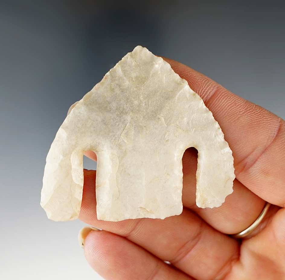 1 3/4" Calf Creek found in Texas. One Barb is restored along with a small amount of the base.
