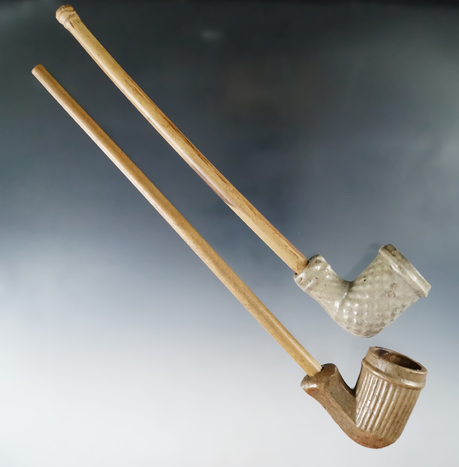 Pair of Clay Tavern Pipes with original stems, largest is 8 3/4".