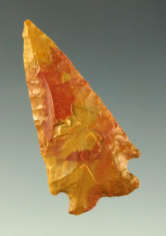 1 1/2" beautiful red and yellow Jasper cornernotch found near the Columbia River, Washington.