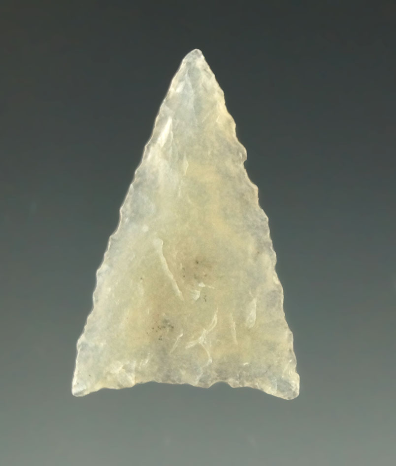 1 1/16" triangular arrowhead made from highly translucent chalcedony found in Washington.