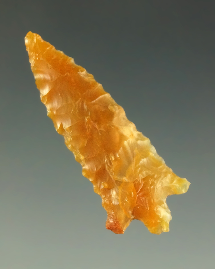 1 1/2" highly translucent gold agate gem point found by Kaye Don Bruce - Washington.