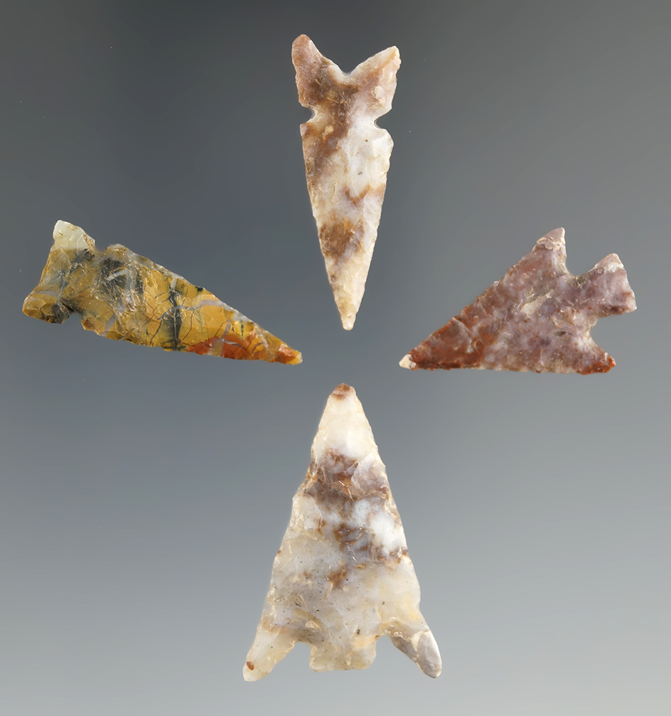 Set of four Texas bird points made from beautiful material, largest is 1 1/8".