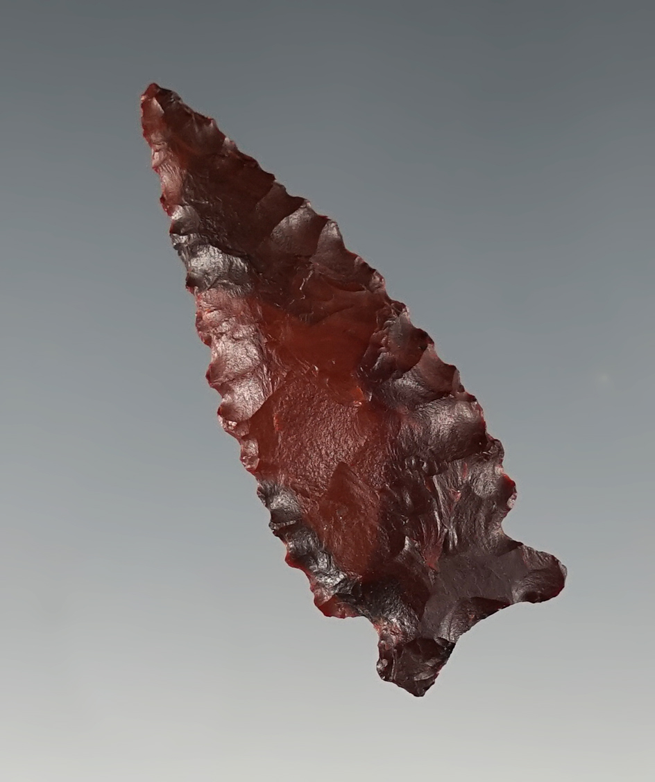 1 3/4" Elko Corner Notch that is nicely serrated made from Jasper. Found in Oregon.