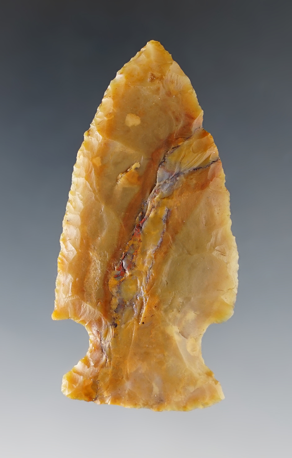 Multi-colored 2 5/8" Hopewell made from Flint Ridge Flint. Crawford Co., Ohio. Bennett COA.