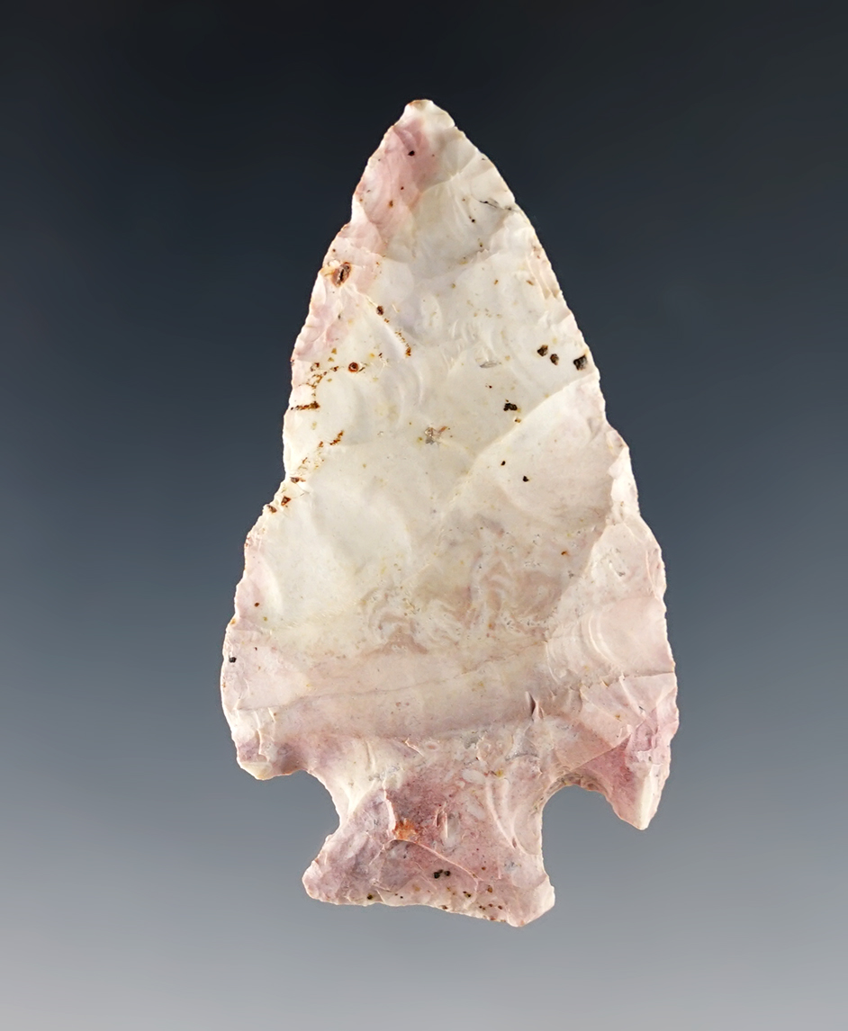 2 1/4" Archaic Cornernotch that is well patinated. Found in Licking Co., Ohio.