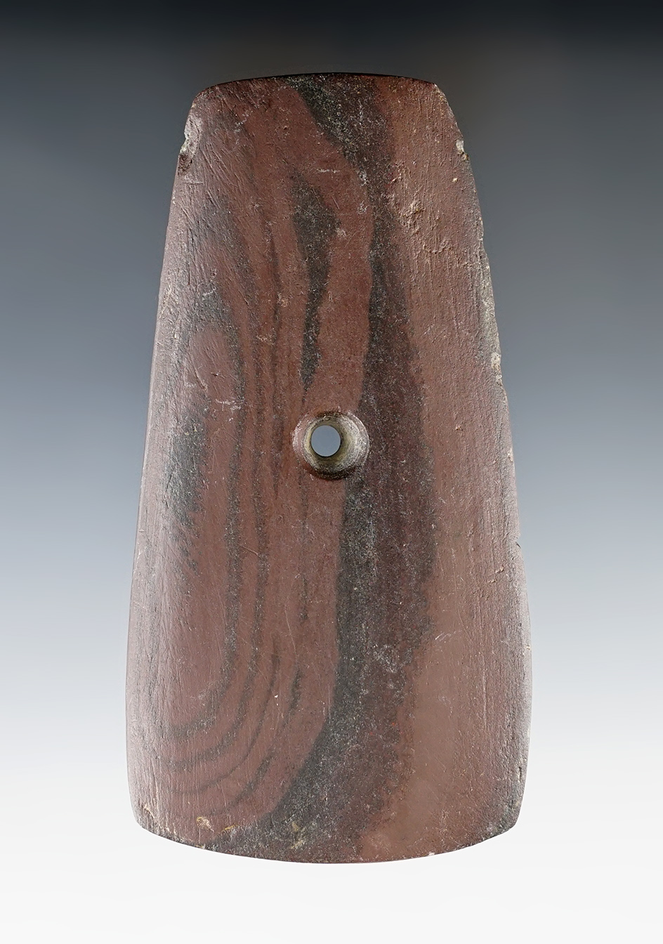 4 3/8" Adena Trapezoidal Pendant made from red and black Banded Slate. Found in Lorain Co., Ohio.