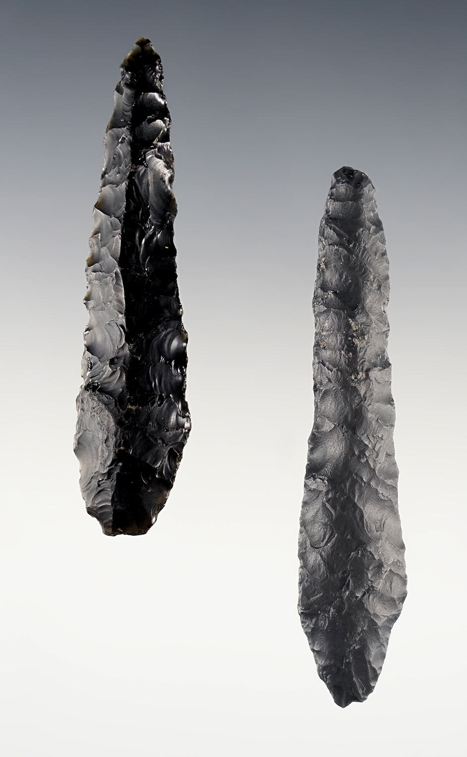 Pair of large early Cascade Shouldered points with grinding to the basal area. 