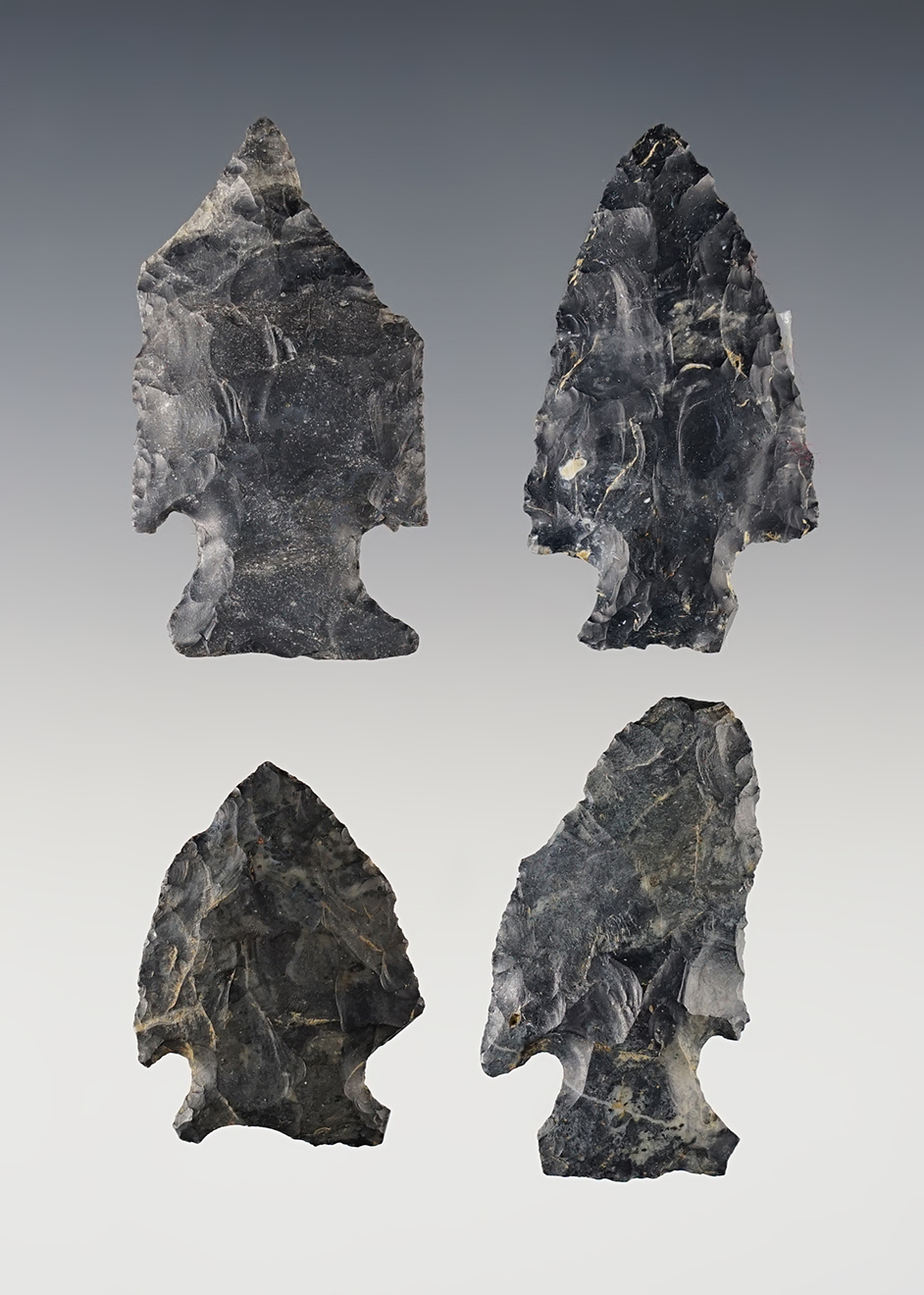 Set of 4  classic Intrusive Mound points found in Ohio. All are made from Coshocton Flint. 