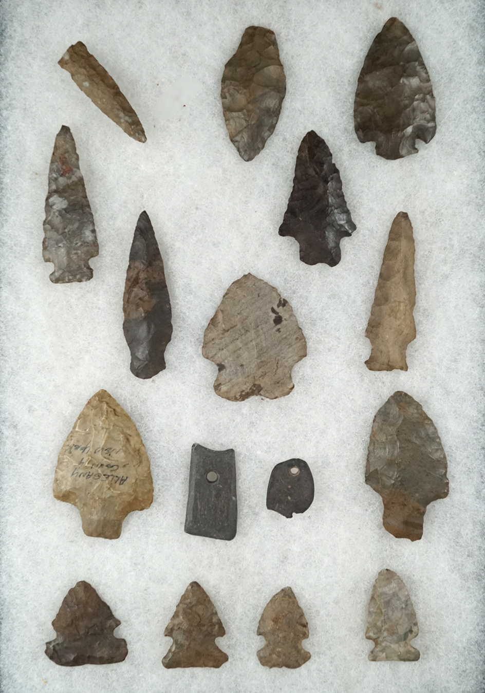 Set of 16 assorted artifacts found in New York. One has a restored base. Largest is 2 1/2".
